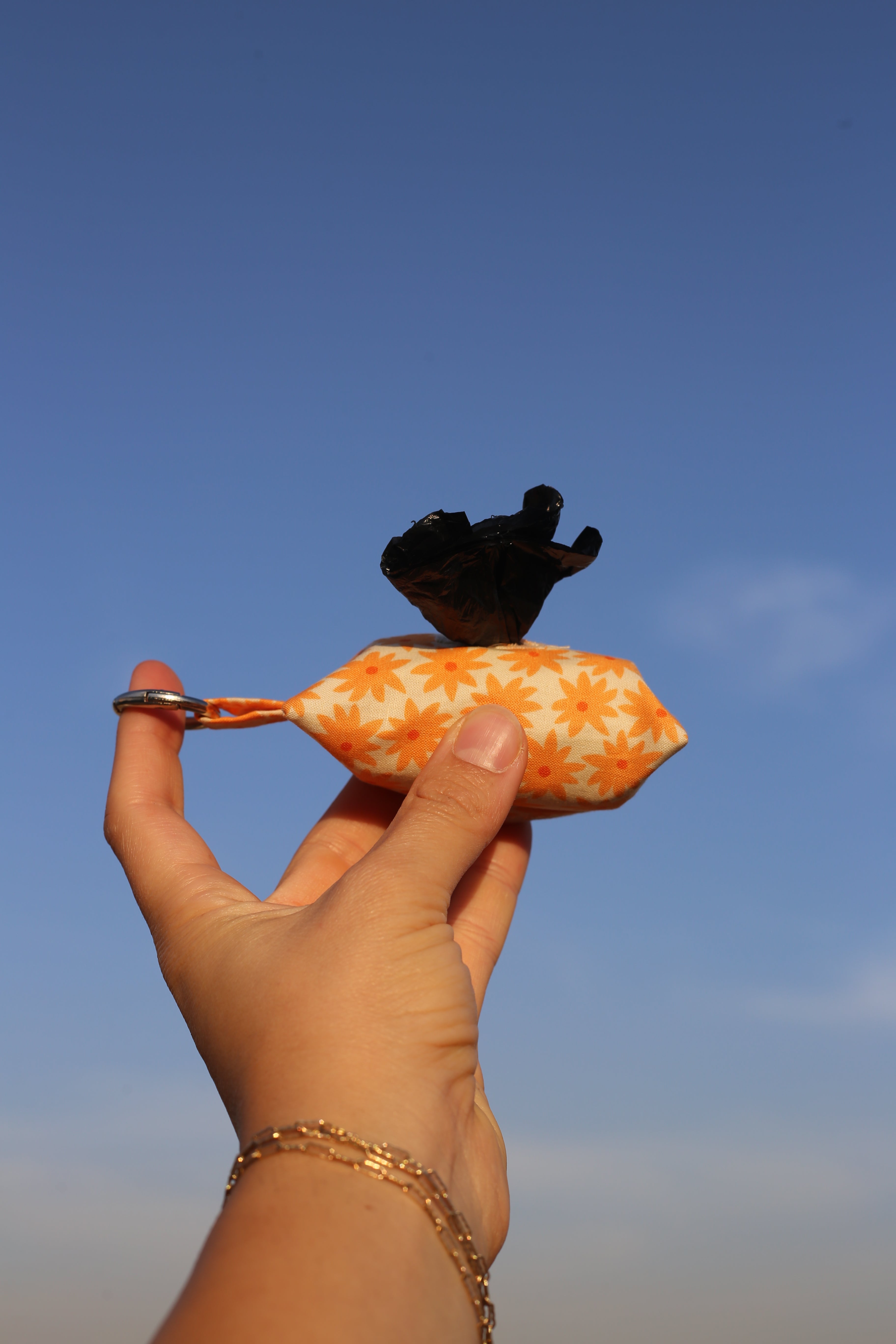 ORANGE GERBERA POO POUCH